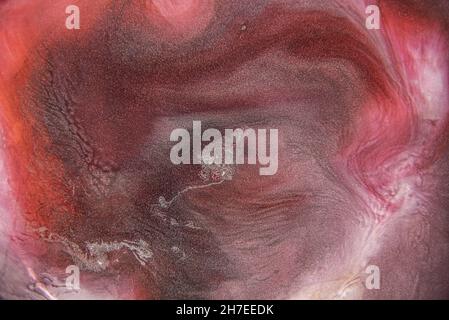 Alcohol ink colors translucent. Abstract multicolored colors texture background. Design wrapping paper, wallpaper. Mixing watercolor paints. Modern Stock Photo