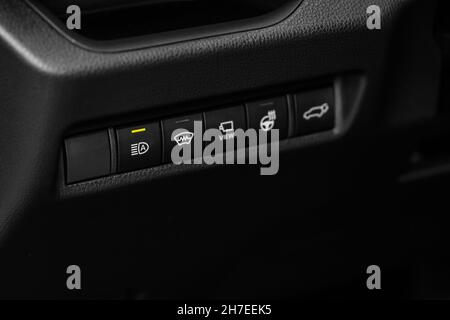 Headlight switch on of modern car. Automatic control of switching on and off the car light. Stock Photo