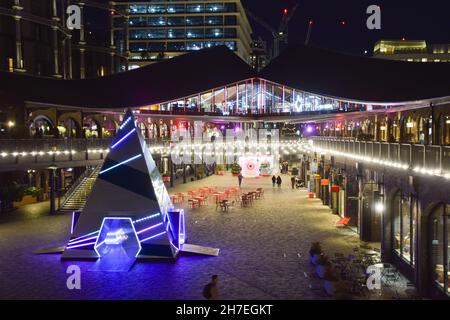 London, UK. 22nd Nov, 2021. The 'Prism' Christmas tree installation designed by This Is Loop is seen at the Coal Drops Yard shopping complex in King's Cross. (Photo by Vuk Valcic/SOPA Images/Sipa USA) Credit: Sipa USA/Alamy Live News Stock Photo