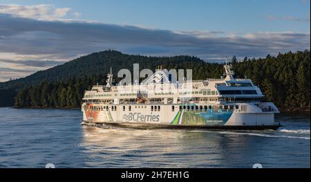 Ferry in front of Coast Mountains. BC Ferry crossing the strait in gulf islands national park. BC Ferries, boat,river Stock Photo