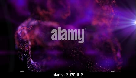 Image of red and pink particles moving in purple light on black background Stock Photo