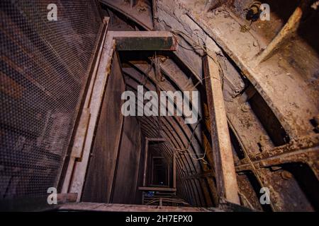 Old technical maintenance tunnel in the subway. Stock Photo