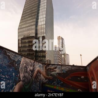 Milan, Italy - November, 16: View of the Repubblica railway station and the Diamond Tower on the background on November 16, 2021 Stock Photo