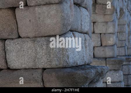 granite blocks in the Roman aqueduct in Segovia. UNESCO World Heritage Site Stock Photo