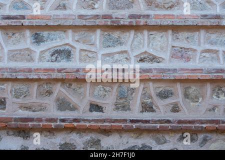 wall background with brick and rustic stone lines Stock Photo