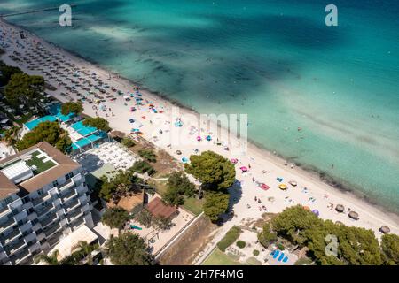 Aerial drone photo of the beach front on the Spanish island Majorca Mallorca, Spain showing the beach known as Platja de Muro in the village of Alcúdi Stock Photo