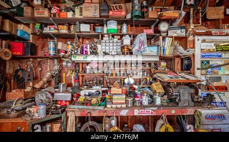 Garage workshop filled with tools and junk Stock Photo