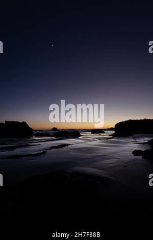 Silhouette of a beautiful rocky coast in Leo Carrillo,  Los Angeles in the USA Stock Photo