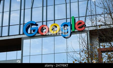 Seattle - November 21, 2021; Multi colored Google sign on a modern glass office building in the South Lake Union neighborhood of Seattle. Stock Photo