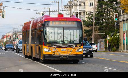 Seattle - November 21, 2021; King County Metro Rapid Ride bus on Route D to Downtown Seattle. This is a diesel electric hybrid bus Stock Photo