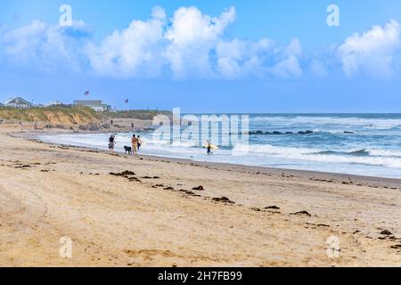 People at Ditch Plains, Montauk, NY Stock Photo