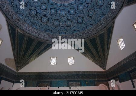 inside the Karatay Madrasa in Konya. Magnificent dome and light coming from top of windows and some of tiles are missing Stock Photo