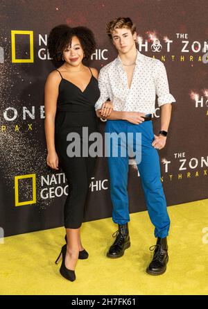 Kayla Lavine and Aydin Eyikan attend the premiere of National