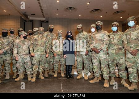 New York, NY - November 22, 2021: Governor Kathy Hochul poses with members of National Guards at turkey packing assembly and addressed media afterwords at Jacob Javits Center Stock Photo