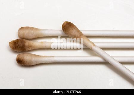 Cerumen on the cotton swabs Stock Photo