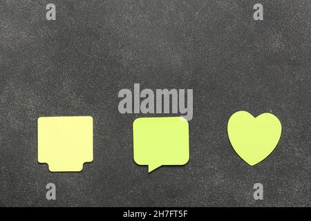Yellow sticky notes on dark background Stock Photo