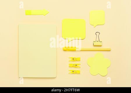 Set of stationery with sticky note papers on color background Stock Photo