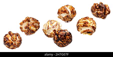 Falling chocolate pop corn isolated on white background Stock Photo