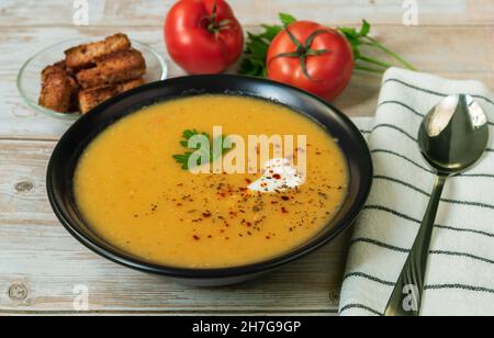 Traditional warming Turkish red lentil puree soup - Merzimek chorbasy. Stock Photo