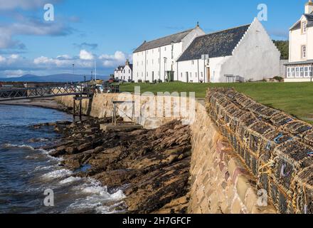 UK, Scotland,  Easter Ross, Ross and Cromarty. Portmahomack fishing village on the Tarbat peninsula. Storehouses or Girnals, restored as housing Stock Photo