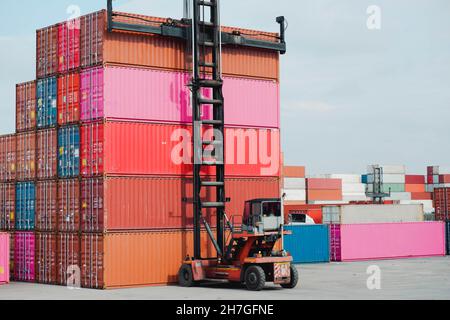 Working in a container yard Container handlers Stock Photo