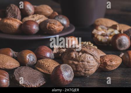 Close up of a selection of mixed nuts in their nutshell with copy space Stock Photo
