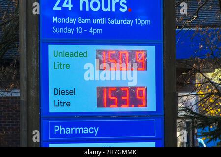 Dorchester, Dorset, UK.  23rd November 2021. Fuel prices are increasing again.  The sign at the Tesco supermarket petrol station at Dorchester in Dorset is showing the price for unleaded petrol at 150.9p per litre and diesel at 153.9p per litre. Picture Credit: Graham Hunt/Alamy Live News Stock Photo
