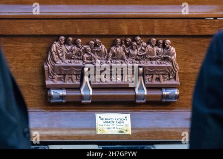 Westminster Cathedral, London, UK. 23rd Nov, 2021. A funeral service, a requiem mass, is taking place at the Catholic Cathedral for the murdered MP Sir David Amess, attended by fellow MPs and invited guests. Casket plaque and carving Stock Photo