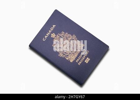 Close-up on a canadian passport isolated on a white background. Stock Photo