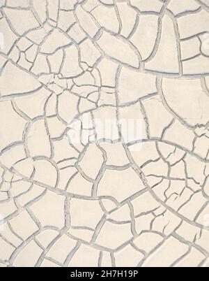 Cracked white clay on dried lakebed, natural beige pattern Stock Photo