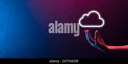 Hand holding icon cloud computing network and icon connection data information in hand. Cloud computing and technology concept Stock Photo