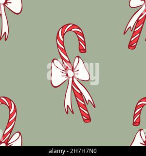 Seamless vector pattern with candy canes on green background. Fun Christmas sweet wallpaper design. Decorative winter festive fashion textile. Stock Vector