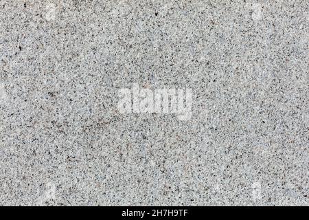 Old wall stone granite texture with a grey and black abstract colour background design, stock photo image Stock Photo