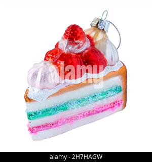 Hanging glass Christmas ornament in the shape of a decorated layer cake. Stock Photo
