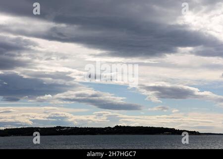 Mixed clouds near Novigrad, Istria, Croatia, Europe. Stock Photo