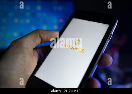 Bangkok, Thailand - November 20, 2021 : iPhone 7 showing its screen with Binance, a cryptocurrency trading application. Stock Photo
