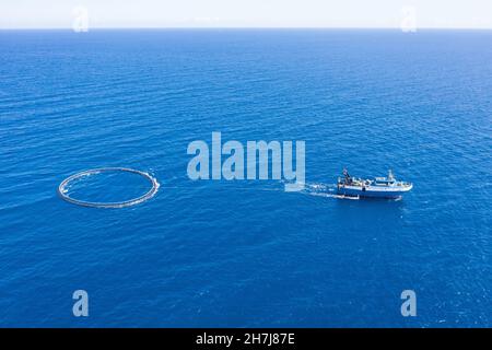 Fishing boat with special equipment for fishing, fish frame sails in the Mediterranean sea Stock Photo