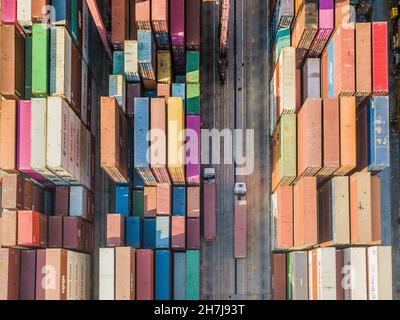 Hong Kong, China, 13 Nov 2021, Two trucks pass in Kwai Chung container port. Stock Photo