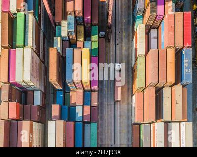 Hong Kong, China, 13 Nov 2021, Two trucks pass in the Kwai Chung Container port. Stock Photo