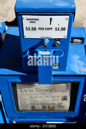 A newspaper vending machine for Taos News, the local newspaper in Taos, New Mexico. Stock Photo
