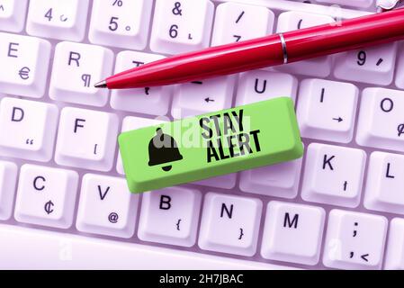 Handwriting text Stay Alert. Business concept Paying full attention to things around Quick to see or understand Compiling And Typing Online Research Stock Photo