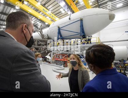 California.US, Nov. 23, 2021, NASA Associate Administrator for the Science Mission Directorate Thomas Zurbuchen, left, and other NASA leadership listen as Julianna Scheiman, director for civil satellite missions at SpaceX, center, gives a tour of the hanger where the Falcon 9 rocket and DART spacecraft are being readied for launch, Monday, Nov. 22, 2021, at Vandenberg Space Force Base in California. DART is the worlds first full-scale planetary defense test, demonstrating one method of asteroid deflection technology. The mission was built and is managed by Johns Hopkins APL for NASAs Planeta