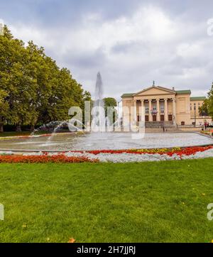 Poznan, Poland - October 2 2020: Square with fountain in Mickiewicz park in front of The Grand Theater of Stanisław Moniuszko Stock Photo