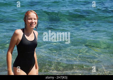 Black female teenager in swimsuit hi-res stock photography and images -  Alamy