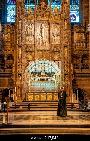 Priest at the Church of Anglican Cathedral of Liverpool Stock Photo