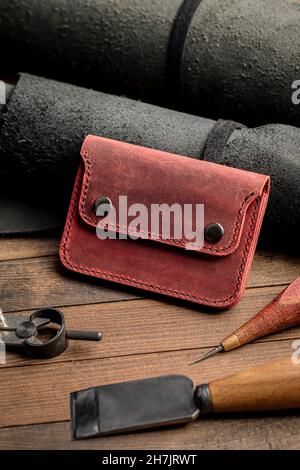 Side view on hand crafted red leather wallet Stock Photo