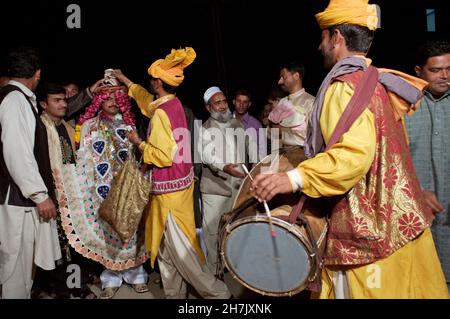 Bhangra, a traditional form of folk music and dance, originated in Punjab province more than 500 years ago. Traditional Bhangra was first performed du Stock Photo