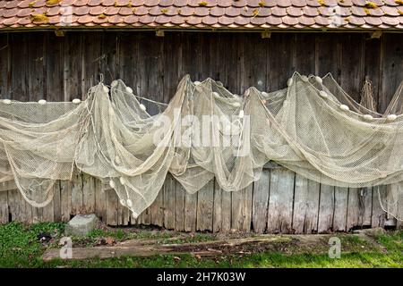 Fishing nets hanging on a wooden hut, Dießen, Diessen, Ammersee, Bavaria, Bayern, Deutschland, Germany, Europe Stock Photo
