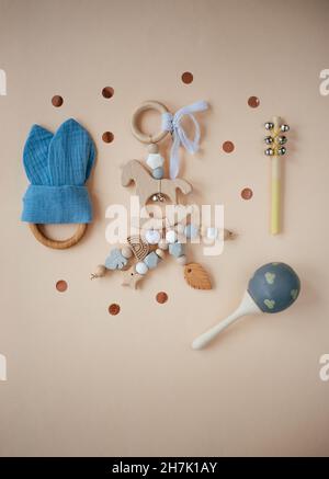 Children's wooden toys, rattles and teethers. Copy space. Stock Photo