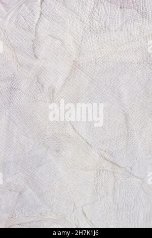 Textured handmade white textile background with mesh and paper base. Vertical background handmade for design Stock Photo